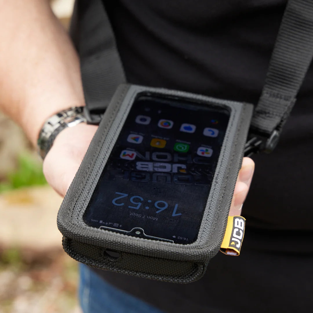JCB case carried on the leather shoulder strap